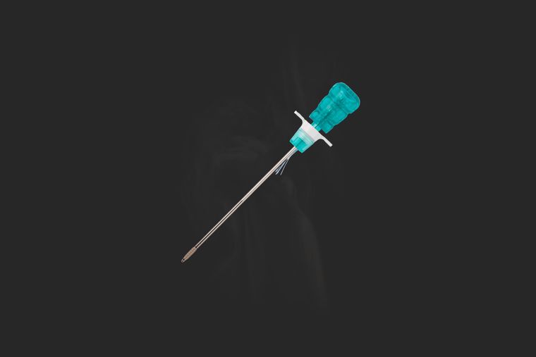 MetaFix PK PEEK-OPTIMA suture anchor on its inserter